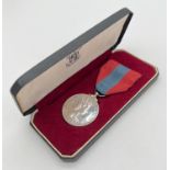 A boxed Royal Mint Elizabeth II Imperial Service Medal named to Benjamin Morris Davies. Complete