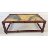 A Chinese dreamstone marble rectangular shaped stand with bamboo effect wooden frame. Approx. 10cm