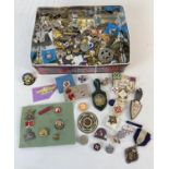 A collection of vintage metal and enamel pin and lapel badges. To include Quilter Guild, Royal