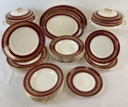 A quantity of assorted mid century Palissy dinner ware with maroon rims and gilt leaf design detail.