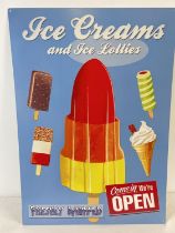 A large reproduction printed tin shop ice cream sign. With holes for wall fixing. Approx. 70cm x