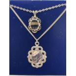 2 vintage blue john pendants on silver chains with spring ring clasps. A 1.6cm pendant on a 17"