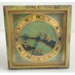 An early 20th century J Cameron of Kilmarnock bedside clock of Oriental design. Green ground with