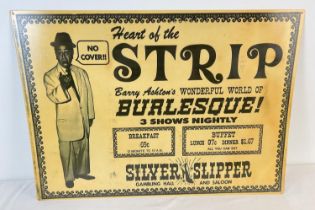 A large reproduction tin advertising sign for Barry Ashton's Burlesque shows at the Silver