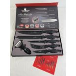 A new boxed Neumann 6 piece knife set, complete with blade/tip guards.