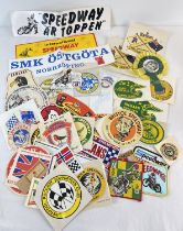 45 vintage cloth patches, stickers and a rosette for British, world and European Speedway teams.