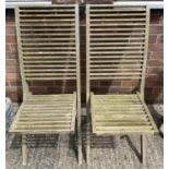 A pair of 'Intertrend' wooden slatted, high backed folding garden chairs.