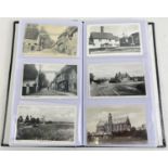 An album of 120 assorted Edwardian & Vintage postcards, to include RP's. Album include ships, street