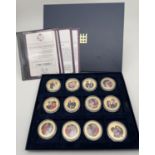 A boxed set of 12 The Royal Wedding Photographic collection 1 dollar Cook Islands coins, by