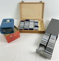 2 boxes of vintage 1960's photographic slides together with a boxed Trident slide viewer.