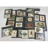 A green ring binder of approx. 150 assorted Victorian & Edwardian greetings cards. All displayed