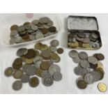 A tub of assorted foreign coins to include coins from: France, Belgium, Germany, India, Netherlands.