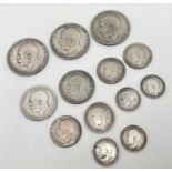 13 silver and half silver George V coins. To include three pence, sixpence, shilling and florin