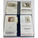 2 albums containing 67 assorted Edwardian & vintage greetings cards.