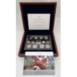 A cased set of 2006 Royal Mint Executive Proof Collection coins in a wooden presentation box. To