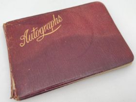 An antique leather bound autograph book dated 1918. Books contains verses and poems, sketches and