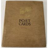 An Art Deco postcard album containing 130+ assorted ship postcards & photographs.
