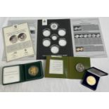 4 boxed or cased collectors coins. The Centenary Of The First World War Â£5 coin, a Dutch 50 yrs