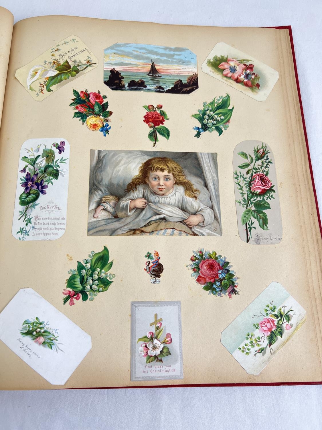 A Victorian red scrap album with decorative gilt design cover, containing assorted scraps & - Image 5 of 7