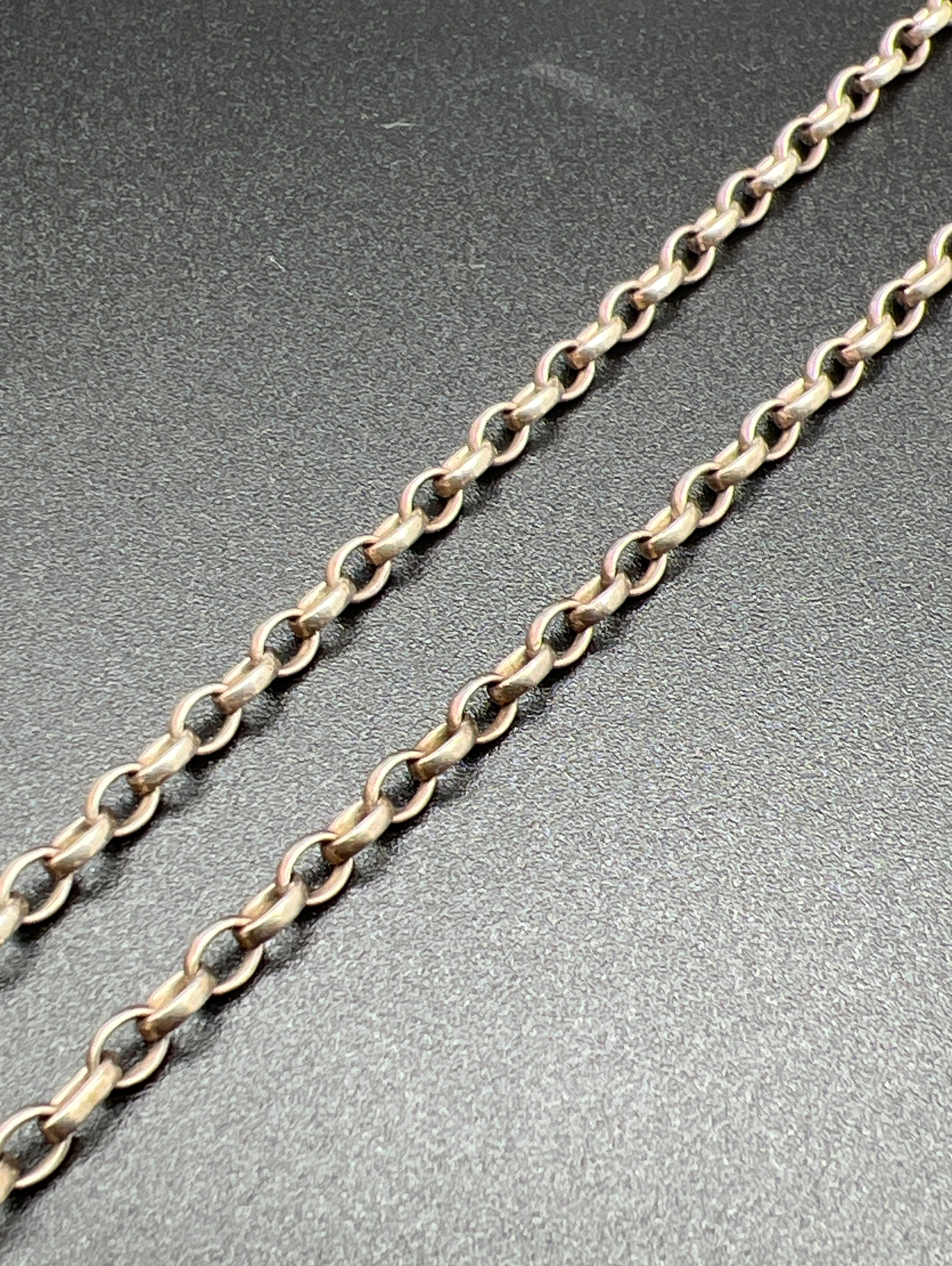 A 22 inch belcher chain necklace with spring ring clasp. Silver marks to clasp and fixings. Total