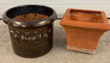 2 modern garden planters. A square shaped terracotta pot together with a lustre glazed circular