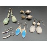 5 pairs of silver, white metal and natural stone drop style earrings. To include floral design set