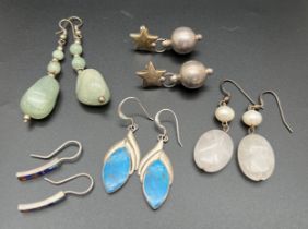 5 pairs of silver, white metal and natural stone drop style earrings. To include floral design set