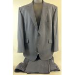 A men's navy blue 2 piece pin striped suit. A 50 inch chest single breasted jacket with blue lining,