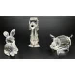 3 boxed retired Swarovski animal crystal figures. A sitting rabbit 7623 NR055000 (repaired), a dog