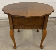 C. Arnold Ltd 1960, mid century workbox on cabriole style legs and with scalloped edge. Central draw