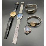 A collection of quartz wristwatches in varying conditions to include a 1999 metal mesh strap Pepsi