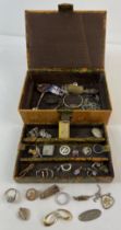 A vintage leather jewellery box with Egyptian decoration to top containing a mixed collection of