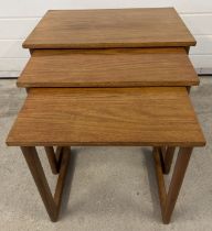A vintage mid century teak nest of 3 tables, approx. 48.5cm tall x 58.5cm wide.