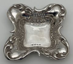 A late Victorian silver square shaped pin dish with decorative scroll & pierced work rim. Fully