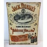 A large reproduction printed tin Jack Daniels advertising sign. With holes for wall fixing.