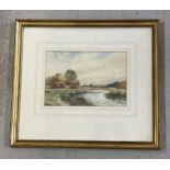 A framed and glazed watercolour of a river scene with cows, by W.H. Harper, signed to bottom left.