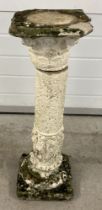 A vintage concrete garden pedestal base with figural detail. Approx. 75cm tall.