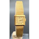 A vintage 18ct gold ladies cocktail watch by The International Watch Co. Mesh bracelet strap with