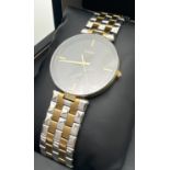 A boxed men's Rado Florence quartz wristwatch 15448866. Gold and silver tone stainless steel strap