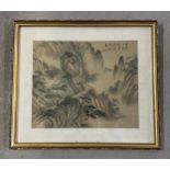 A signed Chinese watercolour on fabric of a mountainous scene, in gilt frame & glazed. Frame size