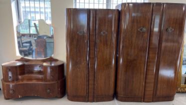 A mid century 'Ronson' dark wood veneer 3 piece bedroom suite with decorative metal knob handles.