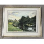 A framed and glazed watercolour of a river scene with church in background, by A. H. Angel, signed