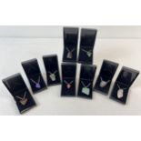 9 boxed natural and semi precious stone pendant necklaces. Each pendant is on a silver or gold