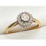 A vintage 18ct gold Illusion set diamond cluster style ring by Ronette. Gold marks to inside of