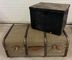 A vintage wooden bound travelling trunk together with a small pine tool box painted black.