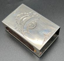 A vintage Art Nouveau style Dutch silver match box holder with floral detail to both sides and empty