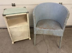 A vintage Lloyd Loom style basket chair by Spinney painted pale blue together with a white painted