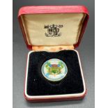 A boxed Royal Mint 1980 Scottish Thistle £2 coin with coloured enamel to both front and back.