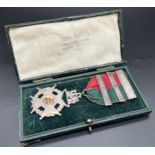 A boxed Fattorini & Sons, Ltd antique silver jewel with ribbon and 3 year date bars. Crescent moon