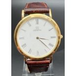 A vintage 28/27.400.615 men's wristwatch by Zenith. Gold tone case and buckle white face and brown